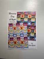 Blooming Day and Night Strip Quilt